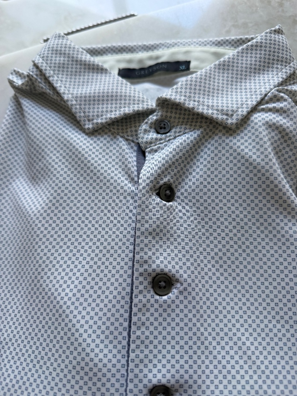 Man’s golf shirt by Greyson with Trump International logo on sleeve XL